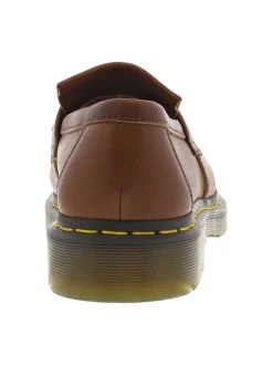 Mocassins marron à semelle à talon plat et avec des franges et un pompon
