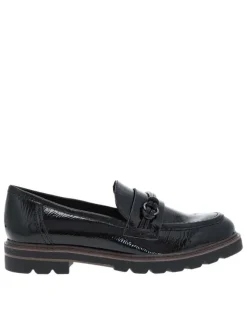 Mocassins noirs vernis à semelle plate avec un bijou à l'avant