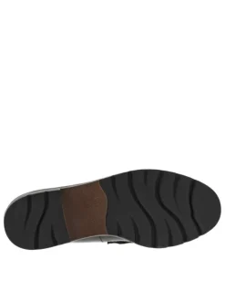 Mocassins noirs vernis à semelle plate avec un bijou à l'avant
