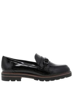 Mocassins noirs vernis à semelle plate avec un bijou à l'avant