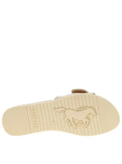Mules dorées et blanches avec une boucle à ardillon sur le bout
