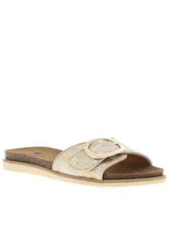 Mules dorées et blanches avec une boucle à ardillon sur le bout