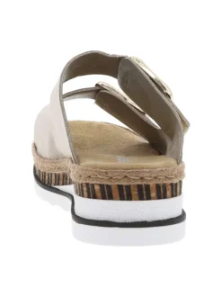 Mules en cuir beiges à talon compensé bas et à sangles à grandes boucles