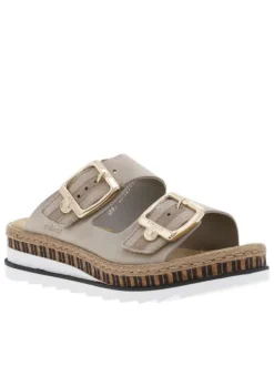 Mules en cuir beiges à talon compensé bas et à sangles à grandes boucles