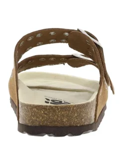 Mules en cuir brunes à talon plat avec boucles à ardillon et oeillets d'aération