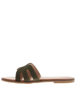 Mules en cuir kaki à semelle plate avec un talon décroché bas