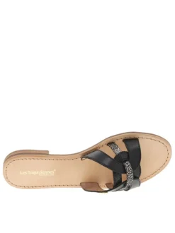 Mules en cuir noires à talon plat avec un aspect tacheté sur les brides avants