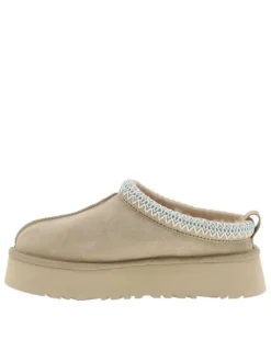 Mules en cuir sable à talon compensé avec logo embossé sur l’avant
