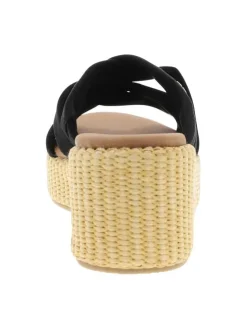 Mules noires avec un talon semi-compensée et des sangles croisées