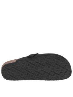 Mules noires à bout fermé avec une boucle à ardillon et une semelle plate