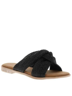 Mules noires à semelle plate avec des brides croisées à l'avant