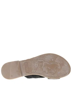 Mules noires à semelle plate avec des brides croisées à l'avant