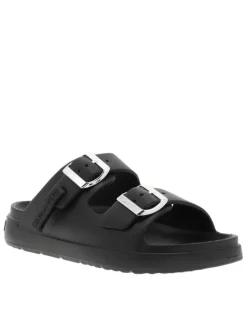 Mules noires à semelle plate et une fermeture à boucle à ardillon