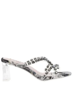 Mules noires à talon décroché haut avec bijoux et semelle à imprimé végétal