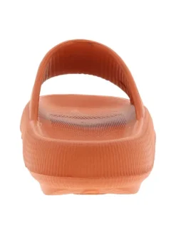 Mules orange avec un talon plateforme et un revêtement texturé