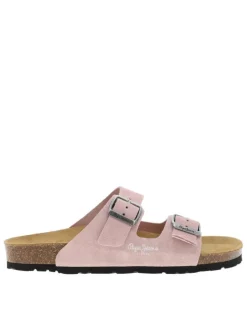 Mules roses en cuir avec un talon plat et 2 boucles à ardillon