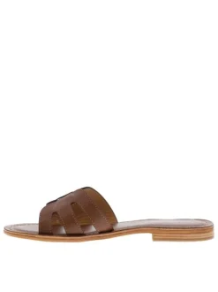 Mules à talon plat Damia marrons en cuir avec bride unique sur la tige
