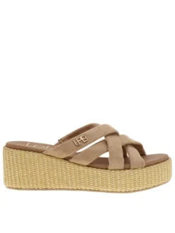 Mules taupe avec un talon semi-compensée et des sangles croisées