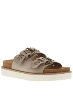 Mules taupe en suède à semelle plate et à sangles à boucle à ardillon