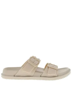 Nu-pieds beiges avec un talon plat et 2 boucle à ardillon avec clous
