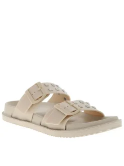 Nu-pieds beiges avec un talon plat et 2 boucle à ardillon avec clous
