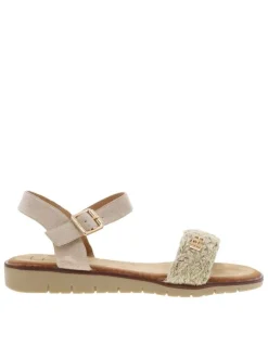 Nu-pieds beige à semelle à talon compensé bas avec une boucle à ardillon