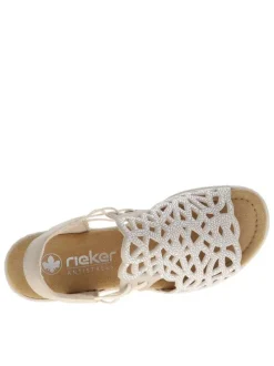 Nu-pieds écrus avec un talon compensé et des lacets élastiqués