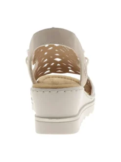 Nu-pieds écrus avec un talon compensé et des lacets élastiqués