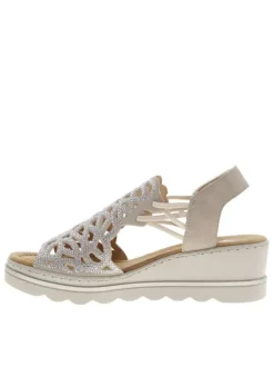 Nu-pieds écrus avec un talon compensé et des lacets élastiqués
