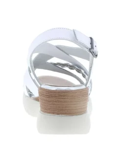 Nu-pieds en cuir blancs à semelle beige avec talon compensé et détails argentés