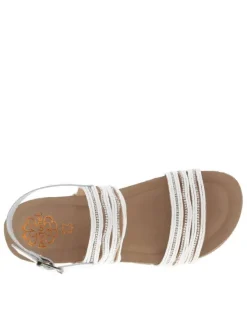 Nu-pieds en cuir blancs à talon plat avec semelle marron et strass brillants