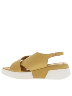 Nu-pieds en cuir jaunes avec chevillière élastiquée et talon semi-compensée