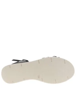 Nu-pieds en cuir noirs à boucle à ardillon avec un talon compensé bas