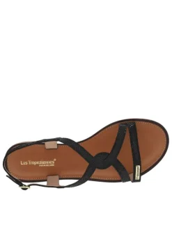 Nu-pieds en cuir noir à semelle à talon décroché bas avec un aspect brillant