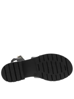Nu-pieds en cuir noirs à semelle plat et à boucle à ardillon