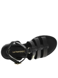 Nu-pieds en cuir noirs à semelle plat et à boucle à ardillon