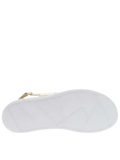 Nu-pieds en simili cuir doré à semelle plate et boucle à ardillon élastiquée