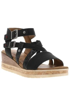 Nu-pieds noirs avec une semelle compensée et des boucles à ardillon