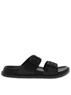 Nu-pieds noirs avec un talon plat et 2 boucles à ardillon avec clous