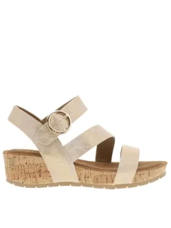 Nu-pieds or à semelle compensé et une fermeture à boucle à ardillon