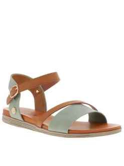 Nu-pieds verts à talon plat et fermeture avec une boucle à ardillon