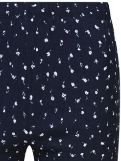 Pantalon bleu marine en crêpe avec un imprimé liberty et une coupe flare