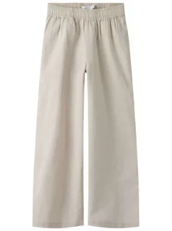 Pantalon chino en lin et coton beige uni pourvu d'une taille élastiquée