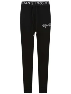 Pantalon jogging noir uni avec une coupe slim et des cordons sur la taille