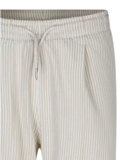 Pantalon beige coupe ample orné d'un motif à rayures verticales