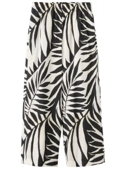 Pantalon beige à motifs pourvu d'une taille élastiquée et d'une coupe large