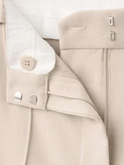 Pantalon beige uni avec une coupe droite et une taille mi-haute