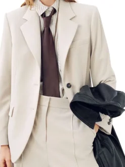 Pantalon beige uni avec une coupe droite et une taille mi-haute