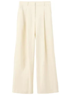 Pantalon beige uni pourvu d'une coupe droite et de passants pour la ceinture