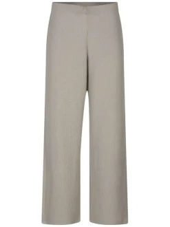 Pantalon beige uni pourvu d'une coupe large et d'une taille haute